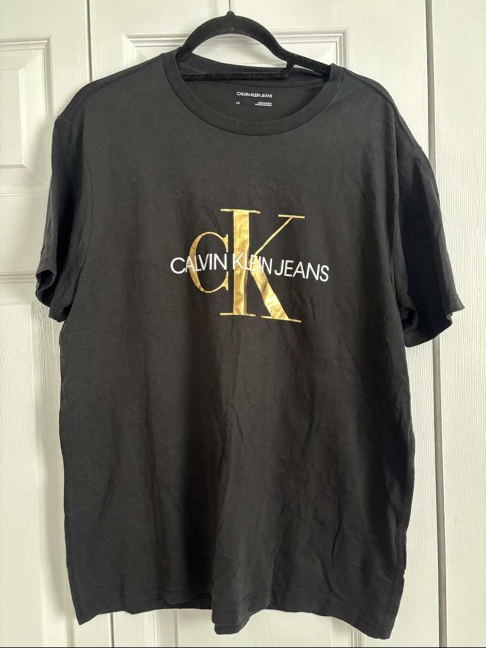 Calvin Klein Jeans Black Tee with Gold CK Monogram
